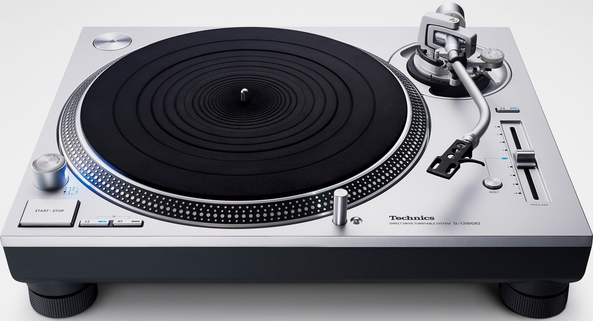 Top-Front view of a Technics SL-1200GR2 turntable with SpinCandy isolation feet installed. Shows external fit and real-world use.